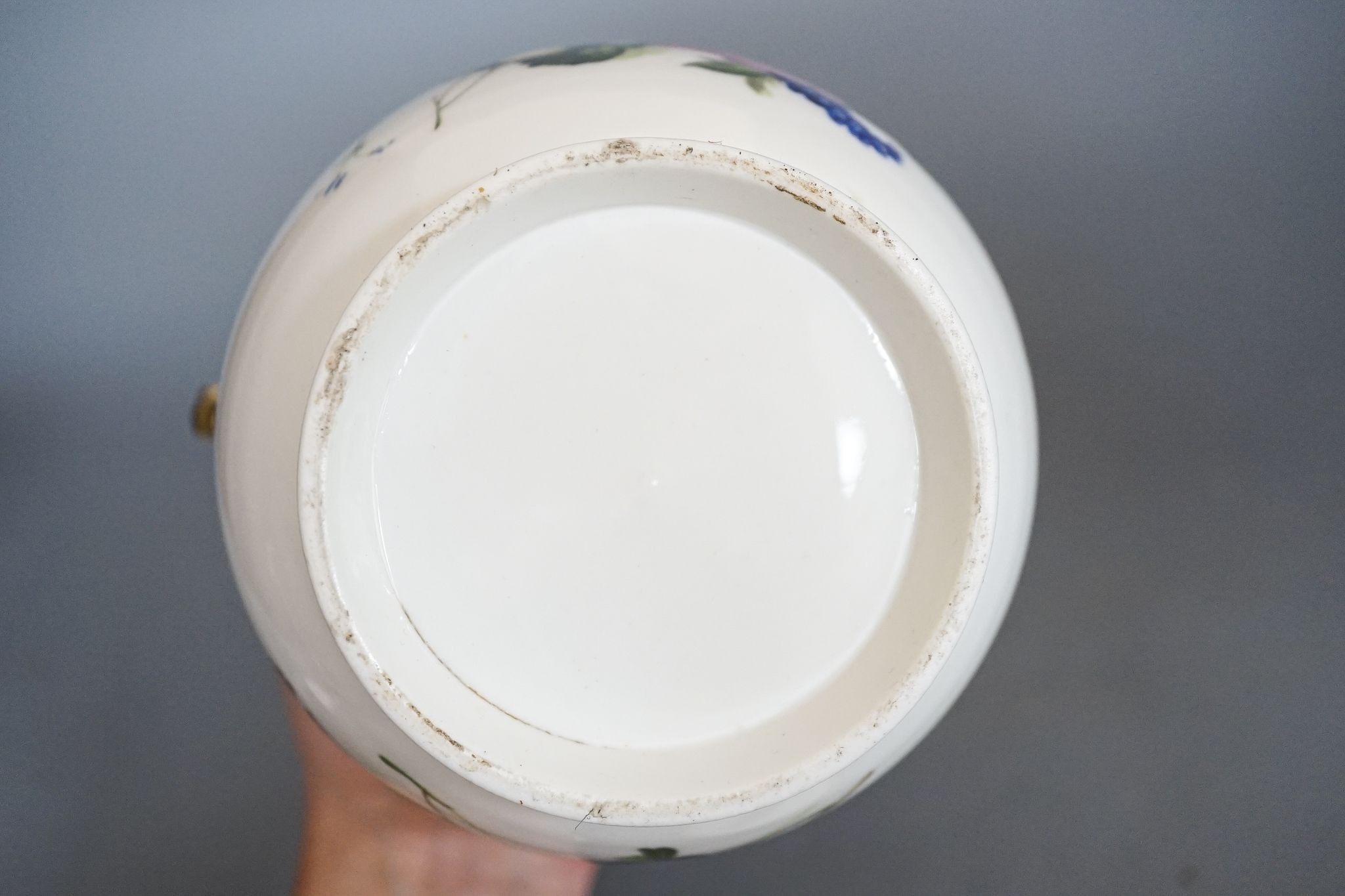 An English porcelain pot pourri vase, cover and inner cover, probably Coalport, painted with roses and flowers 21cm